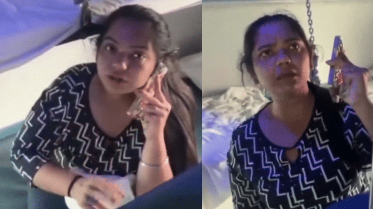 ஓடும் ரயிலில் புகைப்படிக்கும் இளம் பெண் - வைரல் வீடியோ