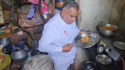 மூதாட்டி வீட்டில் உணவு அருந்தி குறைகளை கேட்ட அமைச்சர் என். ஆனந்த்