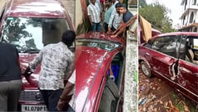 குறுகிய பாதையில் சிக்கிய கார்.. காரணம் 